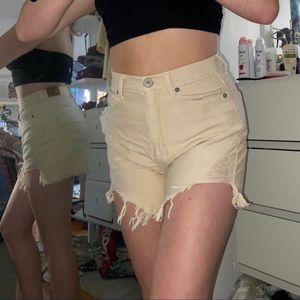 Cream colored High waisted shorts.